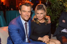 Josh Duhamel (L) and actress/singer Fergie