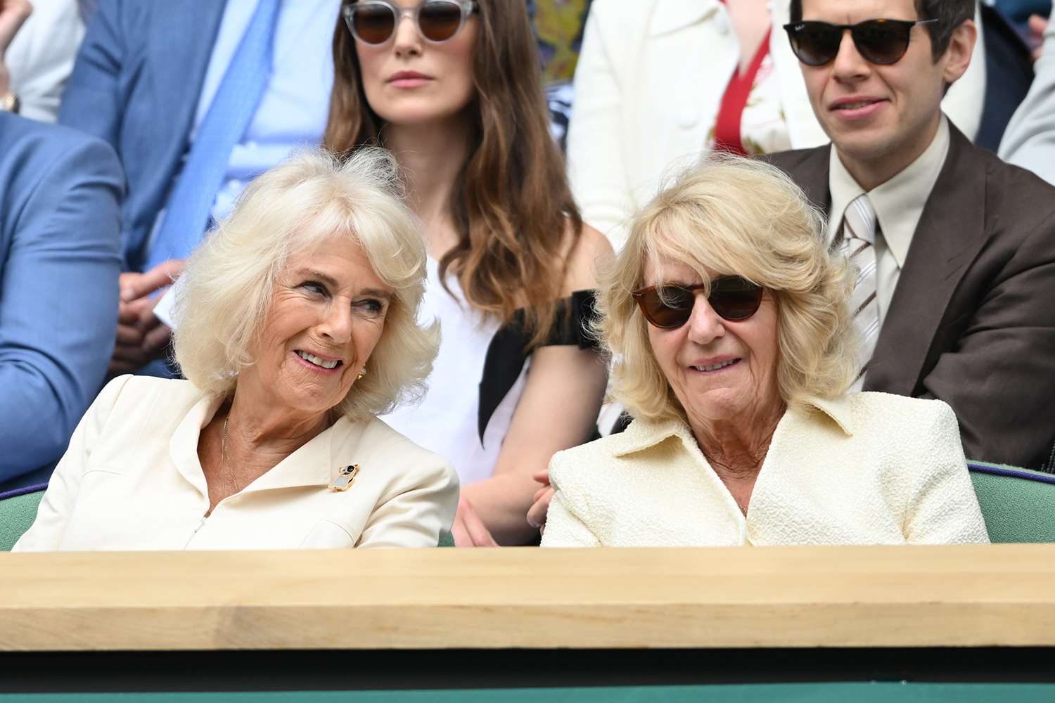 ueen Camilla, Keira Knightley, Annabel Elliot and James Righton attend day ten of the Wimbledon Tennis Championships