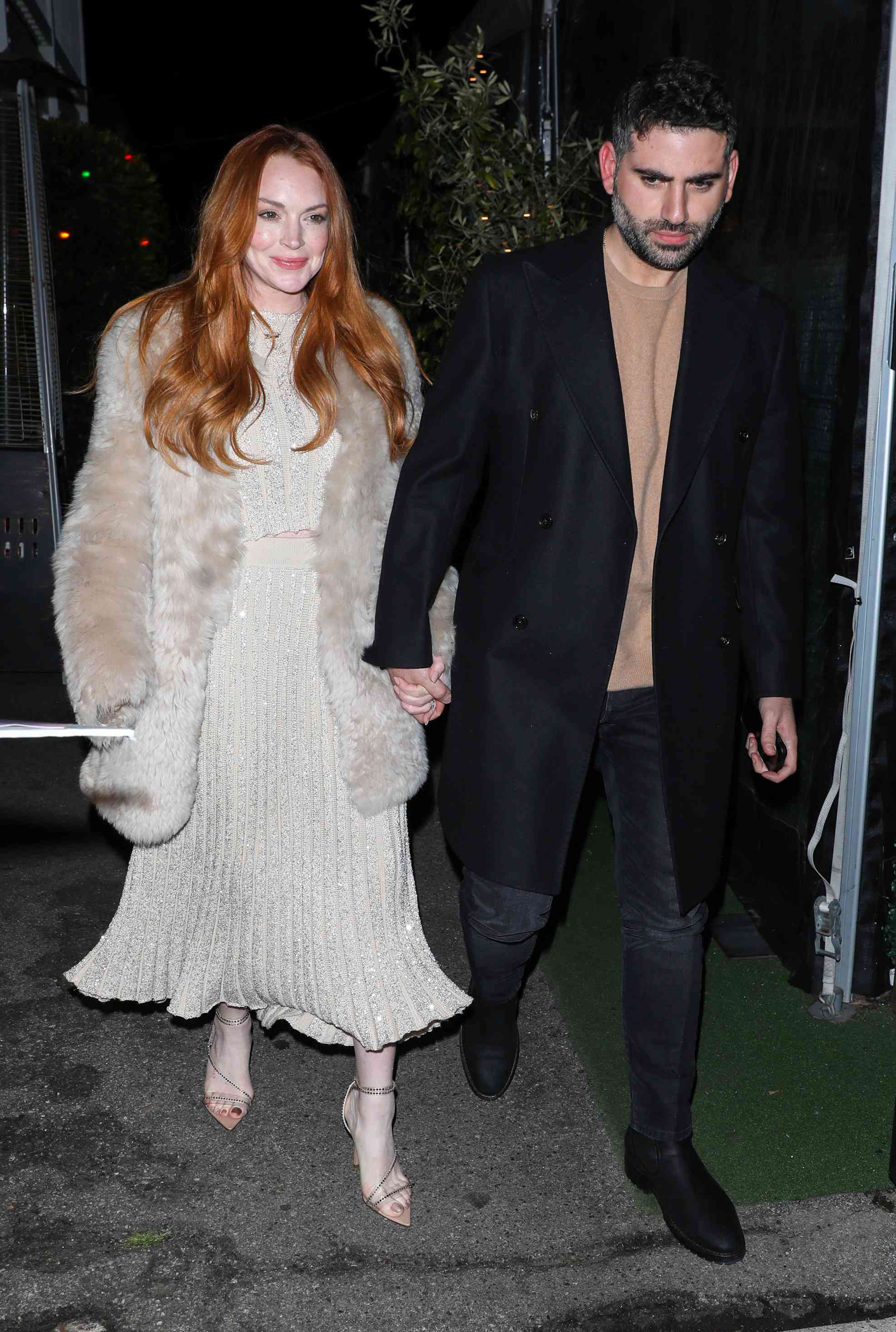 Lindsay Lohan and Bader Shammas are seen leaving Giorgio Baldi on March 16, 2024 in Santa Monica, California. 