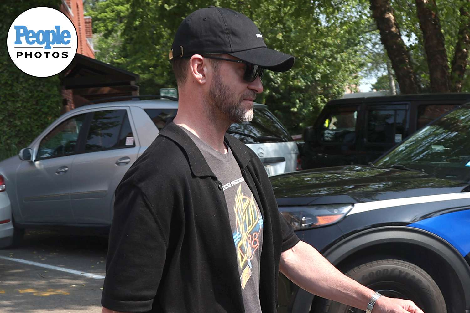 Justin Timberlake leaves a police station in The Hamptons with laywer Ed Burke.