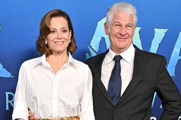 Sigourney Weaver and Jim Simpson attend 20th Century Studio's "Avatar 2: The Way of Water" on December 12, 2022 in Hollywood, California. 