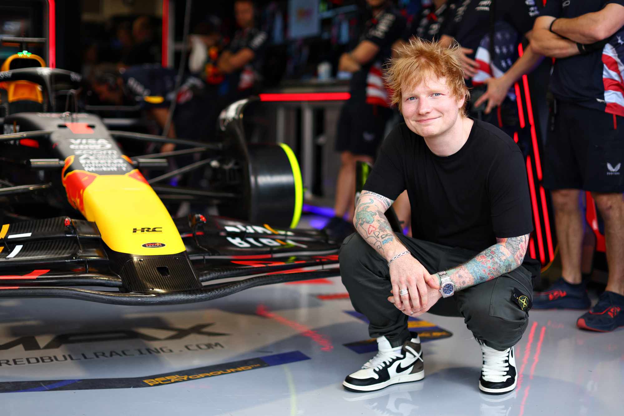 Ed Sheeran poses for a photo outside the Oracle Red Bull Racing garage prior to Sprint Qualifying ahead of the F1 