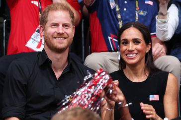 Prince Harry, Duke of Sussex and Meghan, Duchess of Sussex watch the Wheelchair Basketball Finals between USA and France at Centre Court