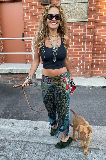 Rita Ora Cuddles with Her New Rescue Dog