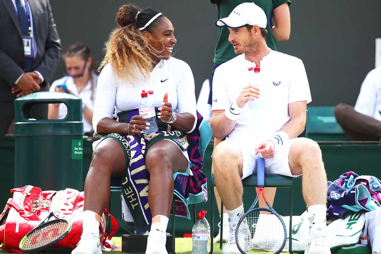 Serena Williams of the United States and Andy Murray of Great Britain in conversation in their Mixed Doubles third round match against Bruno Soares of Brazil and Nicole Melichar of the United States during Day Nine of The Championships - Wimbledon 2019 at All England Lawn Tennis and Croquet Club on July 10, 2019 in London, England