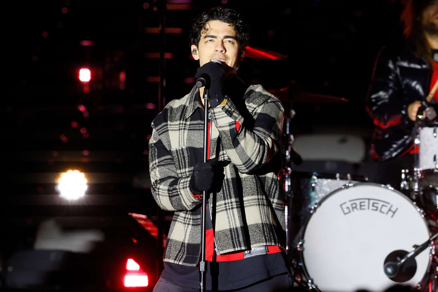 Joe Jonas performs during a pre-game concert prior to the 2024 Navy Federal Credit Union Stadium Series at MetLife Stadium on February 17, 2024