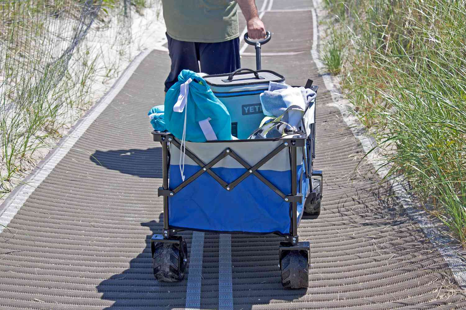 Moon Lence Collapsible Outdoor Utility Wagon being pulled