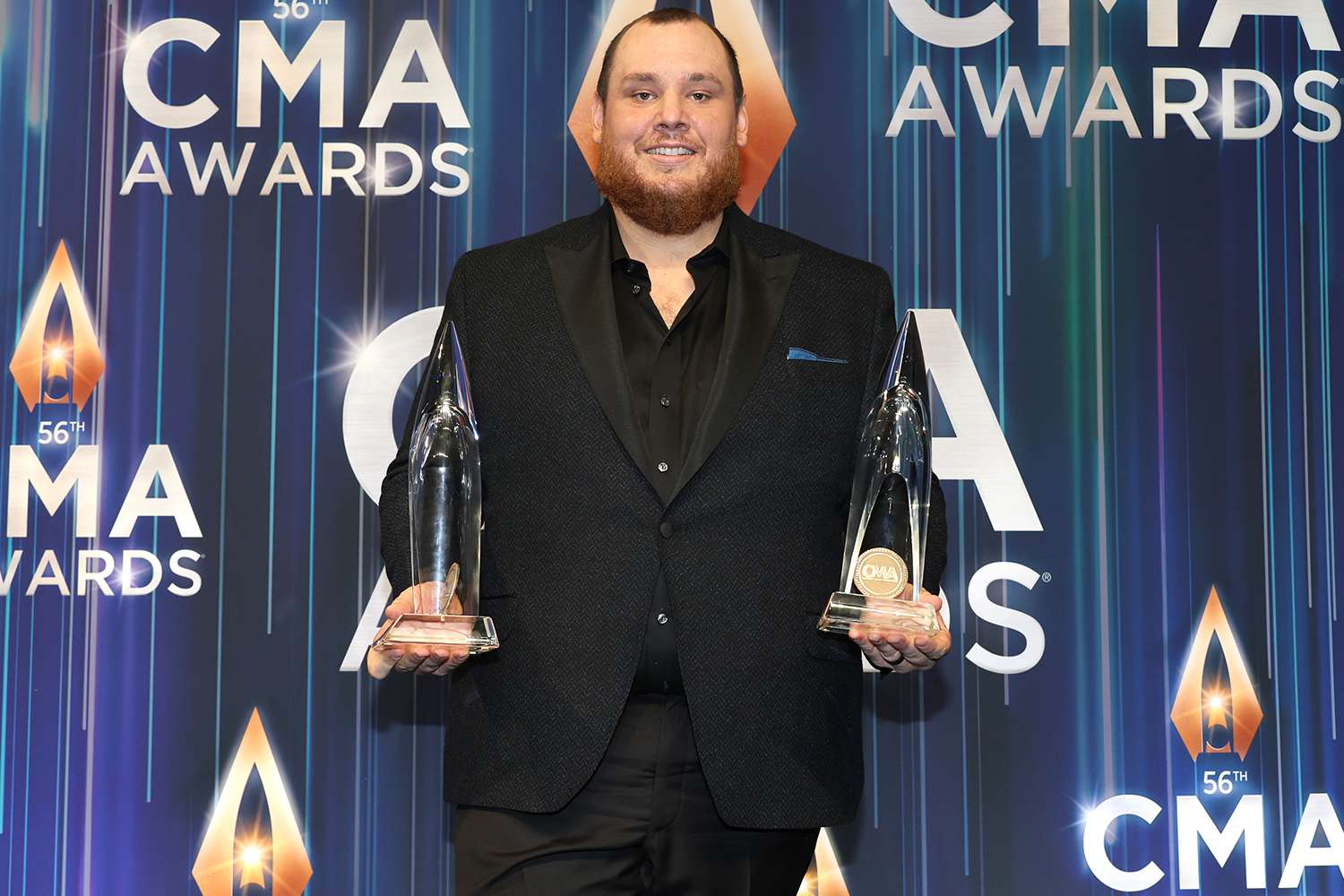 NASHVILLE, TENNESSEE - NOVEMBER 09: Entertainer of the Year and Album of the Year winner Luke Combs poses in the press room during The 56th Annual CMA Awards at Bridgestone Arena on November 09, 2022 in Nashville, Tennessee. (Photo by Jason Kempin/Getty Images)