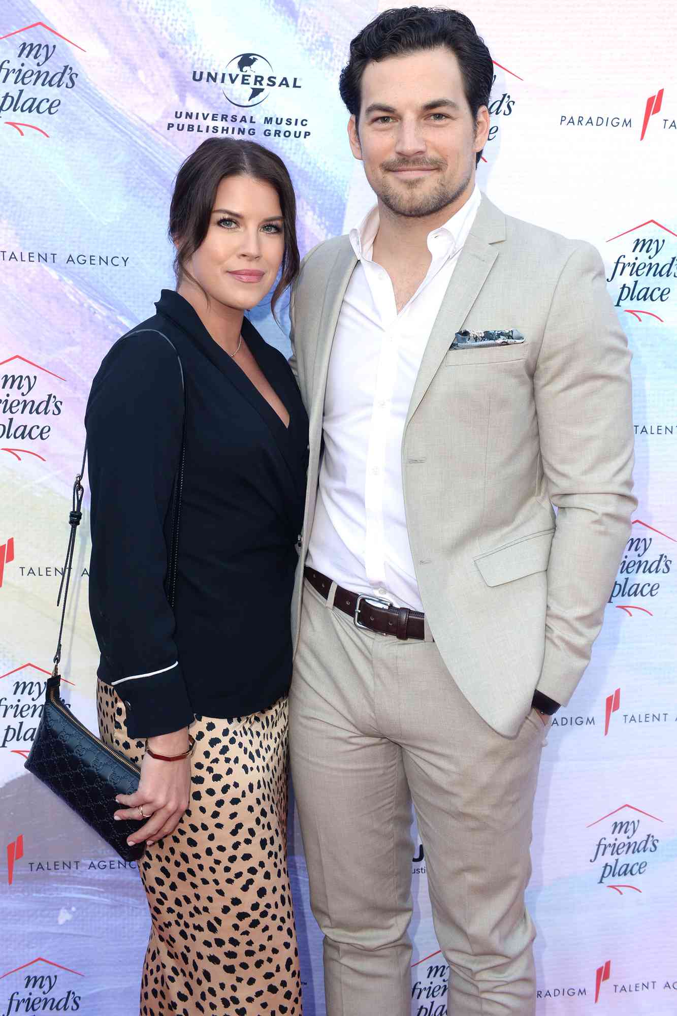 Nichole Gustafson and Giacomo Gianniotti attend Ending Youth Homelessness: A Benefit for My Friend's Place at Hollywood Palladium on April 06, 2019 in Los Angeles, California.