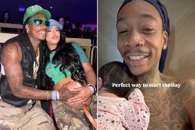 Wiz Khalifa Shares Sweet Photo Cradling Newborn Daughter Kaydence In Bed: 'Perfect Way To Star The Day'