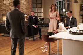 SUITS -- "Tiny Violin" Episode 715 Rick Hoffman as Louis Litt, Sarah Rafferty as Donna Paulsen, Meghan Markle as Rachel Zane, Patrick J. Adams as Mike Ross