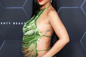 Rihanna poses for a picture as she celebrates her beauty brands fenty beauty and fenty skin at Goya Studios on February 11, 2022 in Los Angeles, California.