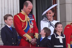 Prince George, the Prince of Wales, Prince Louis, the Princess of Wales and Princess Charlotte on the balcony of Buckingham Palace, London