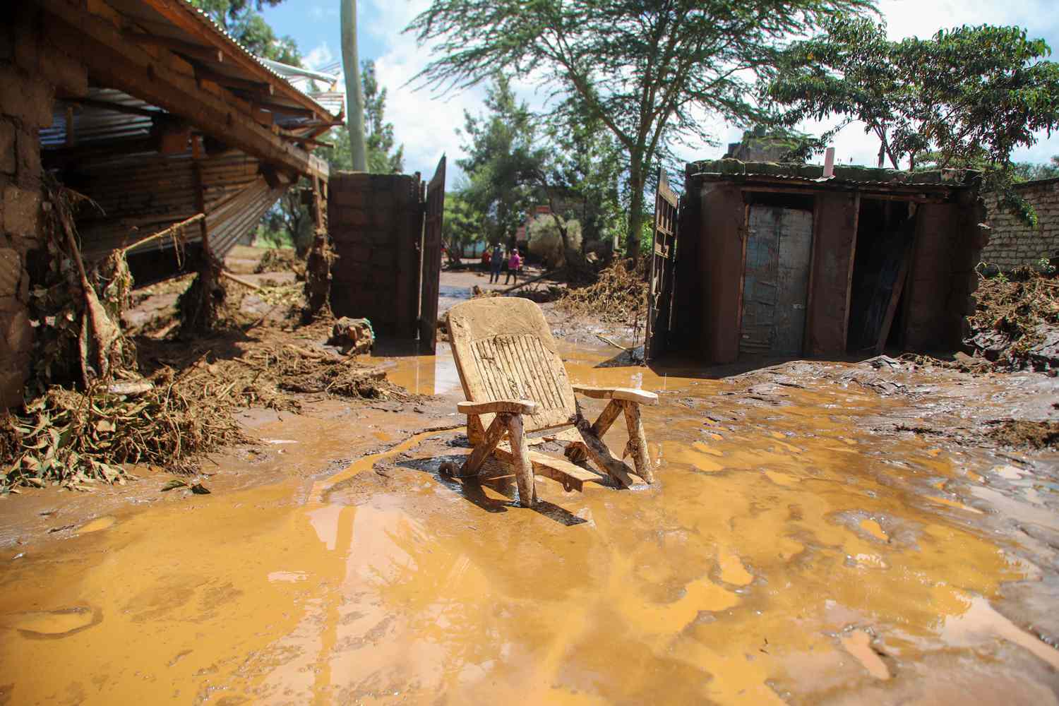 A sit is seen stuck in the mud after a dam bursts in Kamuchiri Village Mai Mahiu, Nakuru County, Kenya, Monday, April. 29, 2024. Police in Kenya say at least 40 people have died after a dam collapsed in the country's west