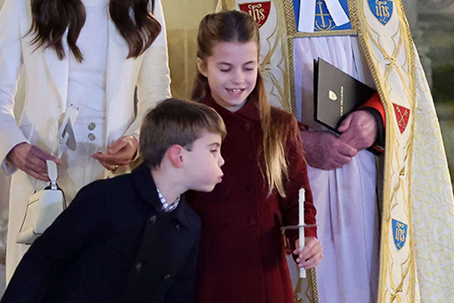 The Dean of Westminster Abbey, The Very Reverend Dr David Hoyle, Prince William, Prince of Wales, Prince George of Wales, Prince Louis of Wales, Catherine, Princess of Wales and Princess Charlotte of Wales attend The "Together At Christmas" Carol Service at Westminster Abbey on December 08, 2023 in London, England.