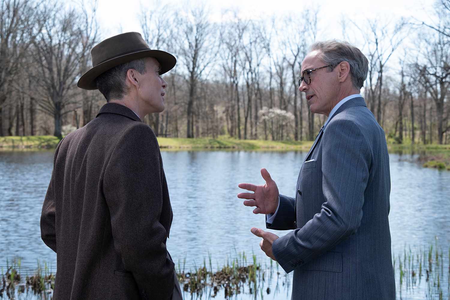 Cillian Murphy is J. Robert Oppenheimer and Robert Downey Jr is Lewis Strauss in OPPENHEIMER, written, produced, and directed by Christopher Nolan.