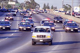 California Highway Patrol chase Al Cowlings, driving, and O.J. Simpson, hiding in rear of white Bronco on the 91 Freeway, just West of the I5 freeway. The chase ended in Simpson's arrest at his Brentwood home.