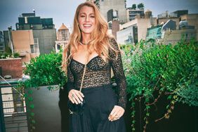 blake lively in black trousers and lace top on rooftop for movie premier night