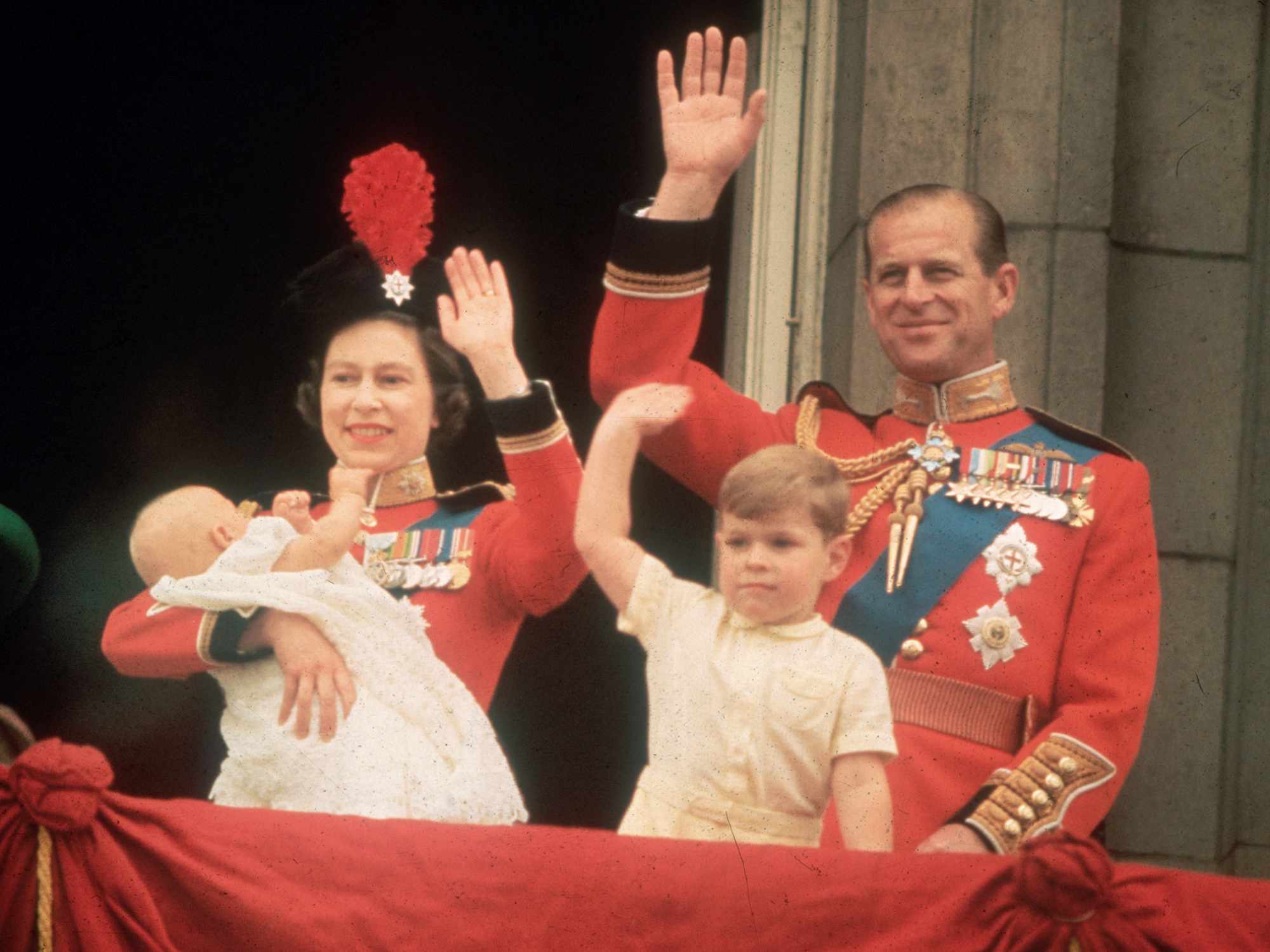 Queen Elizabeth, Prince Philip, Prince Andrew and Prince Edward waving to the crowds from the balcony at Buckingham Palace, during the Trooping of the Colour