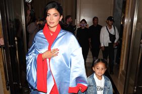 Kylie Jenner Stuns in a Blue and Red Satin Outfit with daughter Stormi Webster