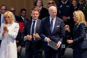 U.S. President Joe Biden, second right, first lady Jill Biden, right, French President Emmanuel Macron, second left, and his wife Brigitte Macron, left, attend a ceremony to mark the 80th anniversary of D-Day at the Normandy American Cemetery in Colleville-sur-Mer, Normandy, France, Thursday, June 6, 2024. World leaders are gathered Thursday in France to mark the 80th anniversary of the D-Day landings.