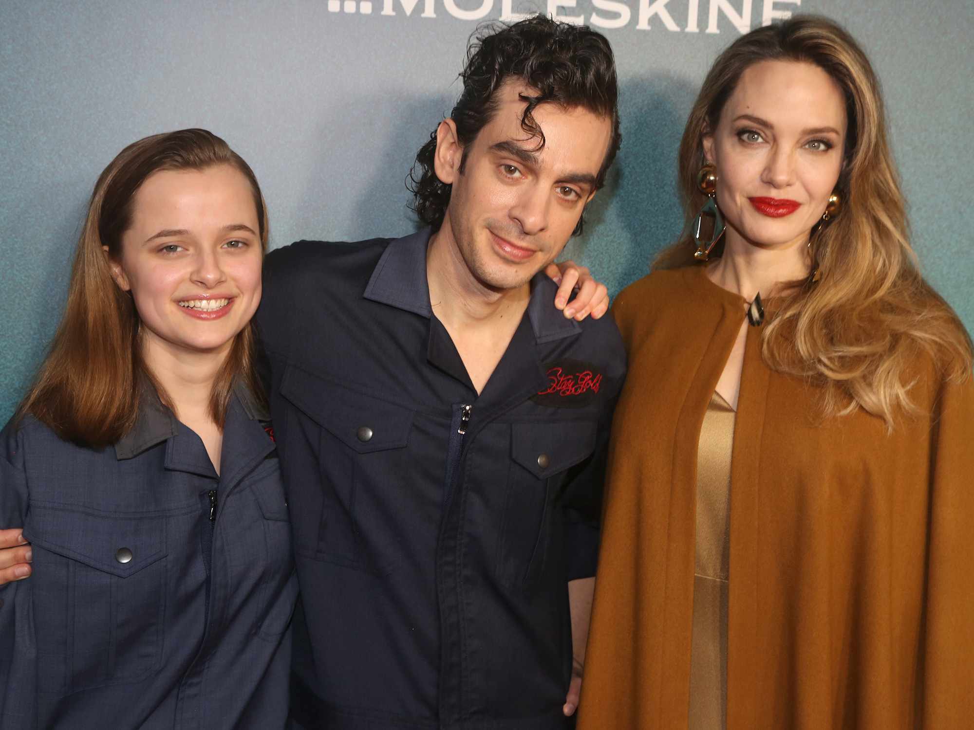 Vivienne Jolie-Pitt, Justin Levine and Angelina Jolie attend the opening night of "The Outsiders" on April 11, 2024 in New York City. 