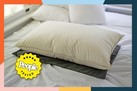 One of the best down pillows on a bed with a colorful border and a People Tested badge. 