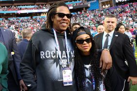 Jay-Z poses looks on with his daughter Blue Ivy Carter before Super Bowl LVII between the Kansas City Chiefs and the Philadelphia Eagles at State Farm Stadium on February 12, 2023 in Glendale, Arizona