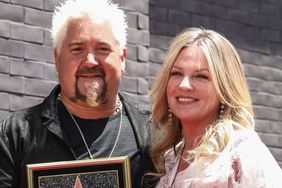 Guy Fieri (L) and his Wife Lori Fieri attend the ceremony to honor Guy Fieri with a Star on the Hollywood Walk of Fame on May 22, 2019 in Hollywood, California