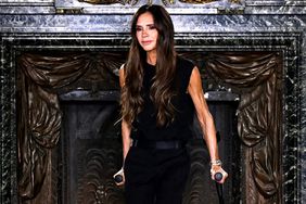 British fashion designer and singer Victoria Beckham takes to the catwalk on crutches after presenting her Women Ready-to-wear Fall-Winter 2024/2025 collection as part of the Paris Fashion Week, in Paris on March 1, 2024.