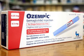 In this photo illustration, boxes of the diabetes drug Ozempic rest on a pharmacy counter