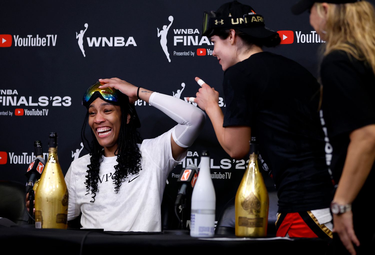 A'ja Wilson #22 and Kelsey Plum #10 of the Las Vegas Aces speak in a press conference after defeating the New York Liberty during Game Four of the 2023 WNBA Finals at Barclays Center on October 18, 2023