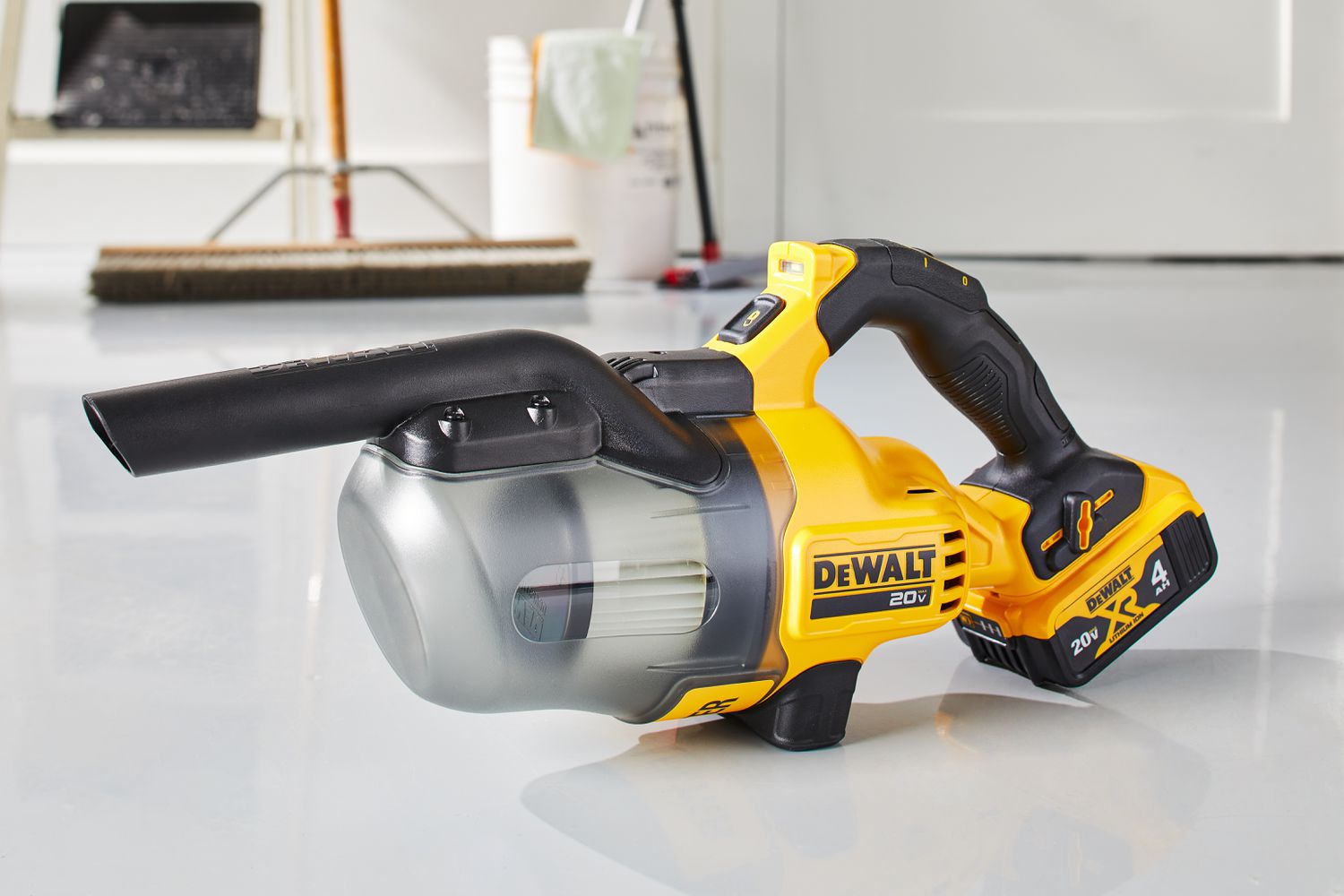 Dewalt 20-Volt Cordless Handheld Vacuum sitting on the floor