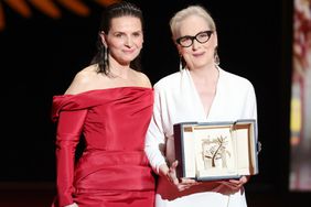 Meryl Streep (R) receives the Honorary Palme DÃ¢ÂÂOr Award from Juliette Binoche (L) on stage during the opening ceremony at the 77th annual Cannes Film Festival at Palais des Festivals on May 14, 2024 in Cannes, France