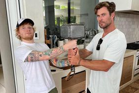 Ed Sheeran and Chris Hemsworth Pose with 'Thor' Hammer 