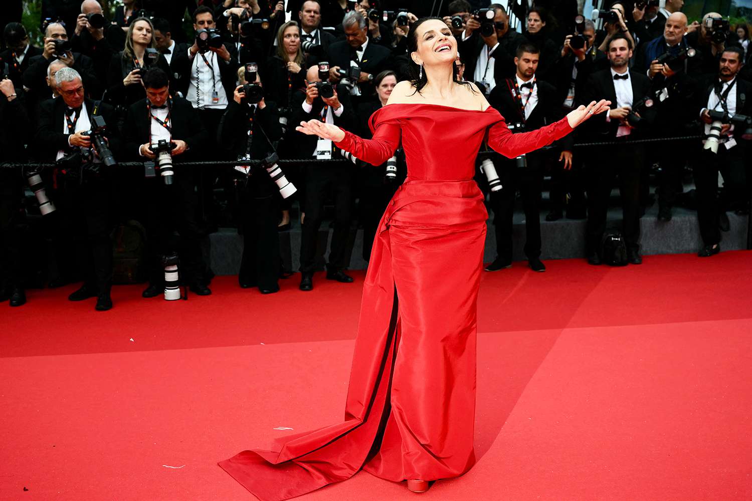 Juliette Binoche arrives for the Opening Ceremony and the screening of the film "Le Deuxieme Acte" at the 77th edition of the Cannes Film Festival in Cannes, southern France, on May 14, 2024.