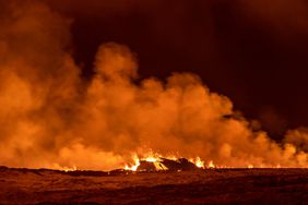 A volcano spews lava and smoke as it erupts in Grindavik, Iceland, December 18, 2023.