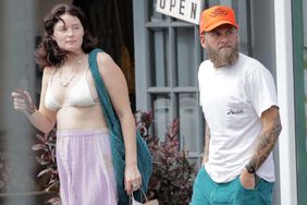 Lovebirds Jonah Hill and Olivia Millar shop at a children's clothing store during their Hawaiian vacation.