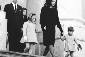 Members of the Kennedy family leave the US Capitol follwing a brief service, leaving the body of assassinated President John F. Kennedy where it will lie in state, Washington DC, November 24, 1963. Visible are Jacqueline Kennedy (1929 - 1994) (center), her children, John Kennedy Jr (1960 - 1999) (right) and Caroline Kennedy, and her brother-in-law Ted Kennedy