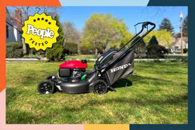 Honda Self Propelled Twin Blade System Smart Drive outdoors on grass