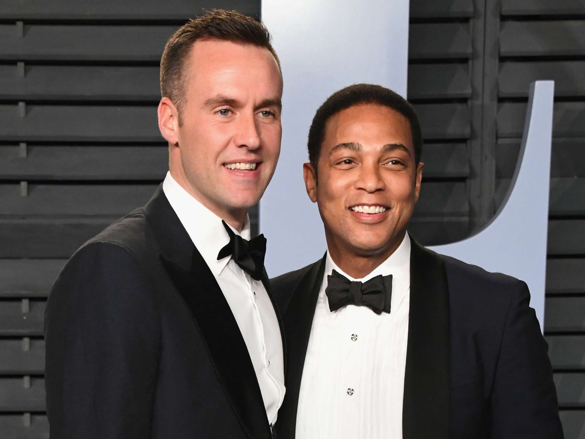 Tim Malone (L) and Don Lemon attend the 2018 Vanity Fair Oscar Party