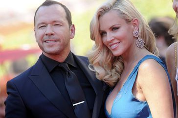 Jenny McCarthy and Donnie Wahlberg arrive at the 2014 Creative Arts Emmy Awards at Nokia Theatre L.A. Live on August 16, 2014 in Los Angeles, California