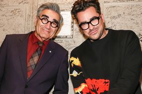 Eugene Levy and Dan Levy are seen during the "Best Wishes, Warmest Regards" book launch at The Beacon Theatre on October 25, 2021 in New York City