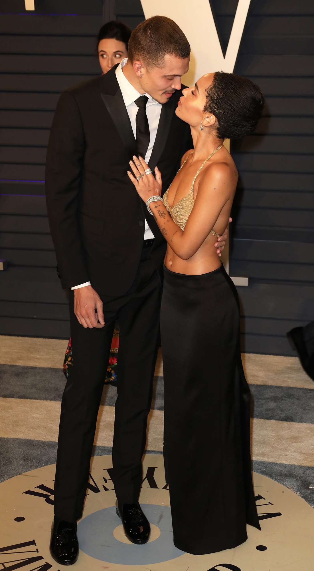 Karl Glusman and Zoe Kravitz attend the 2019 Vanity Fair Oscar Party hosted by Radhika Jones at Wallis Annenberg Center for the Performing Arts on February 24, 2019 in Beverly Hills, California