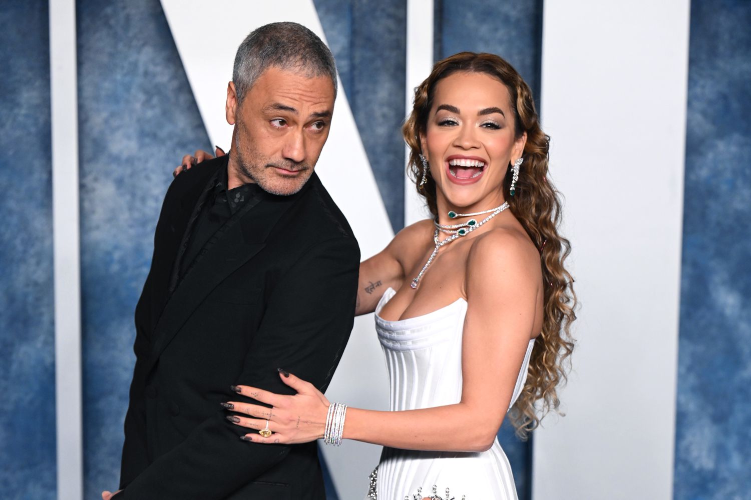 Taika Waititi (L) and Rita Ora attend the 2023 Vanity Fair Oscar Party hosted by Radhika Jones