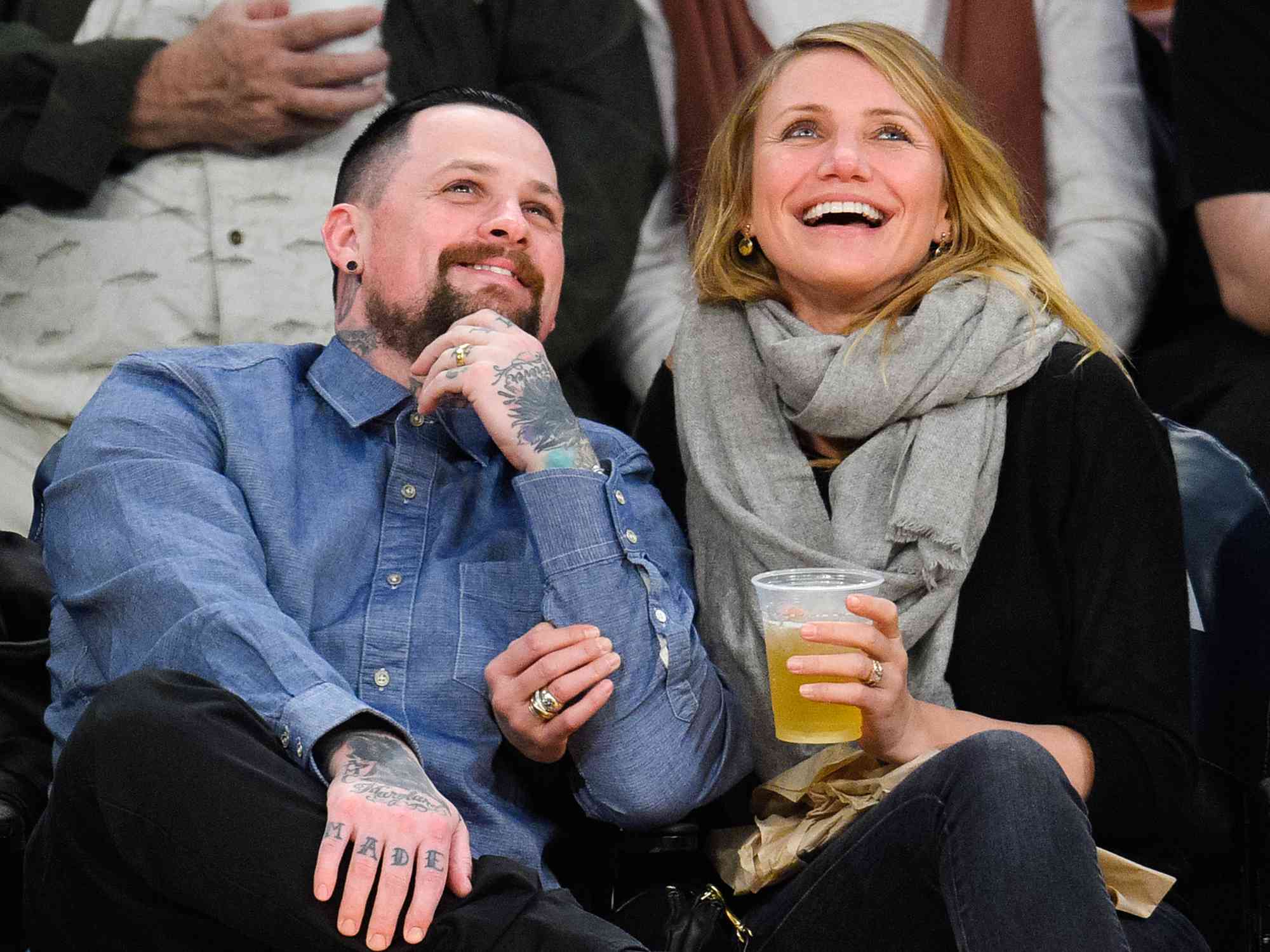 Benji Madden (L) and Cameron Diaz attend a basketball game between the Washington Wizards and the Los Angeles Lakers at Staples Center on January 27, 2015 in Los Angeles, California