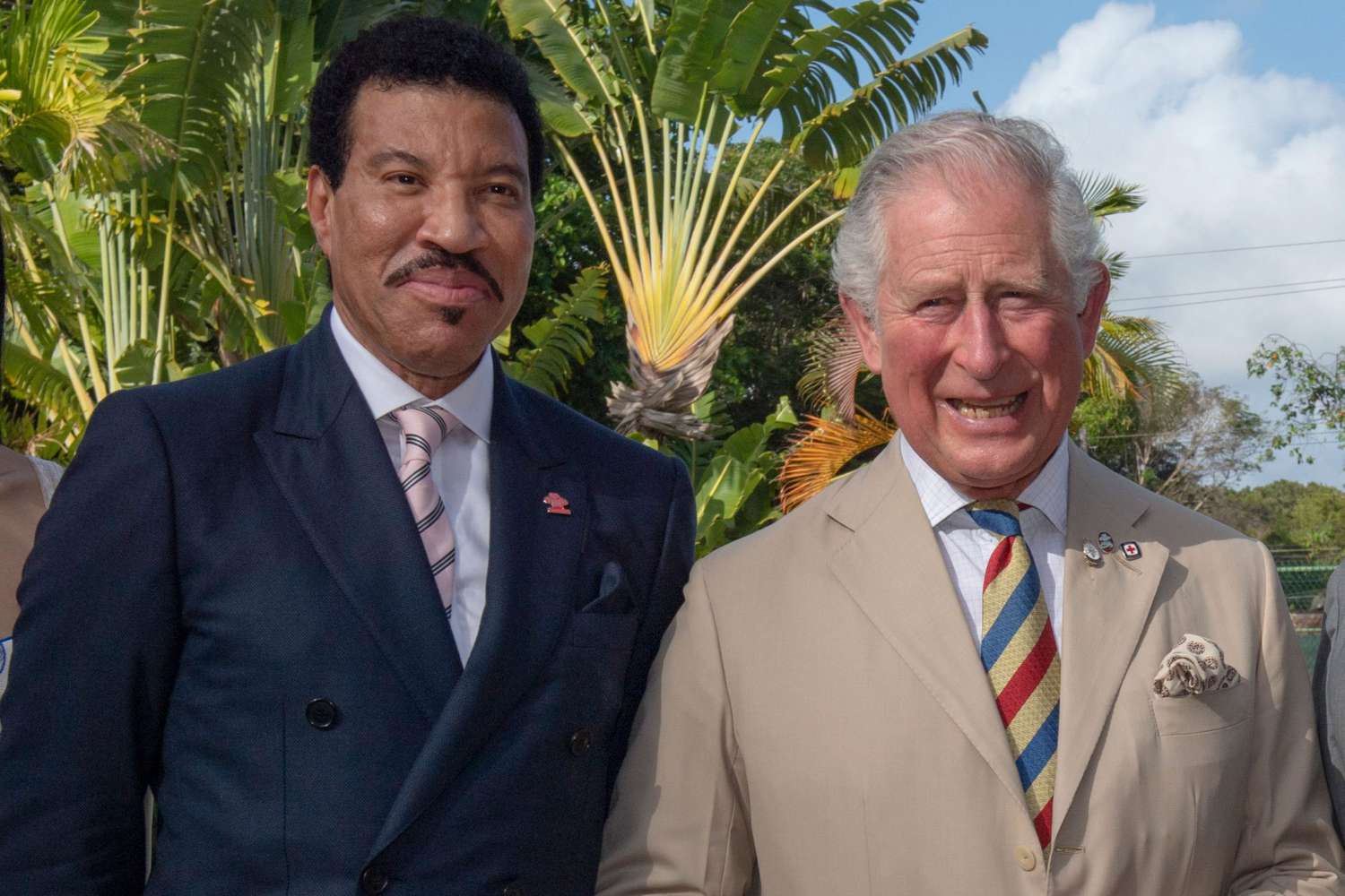 FOLKSTONE, BARBADOS - MARCH 19: (L-R) Lionel Richie, Prince Charles, Prince of Wales and Sir Tom Jones attend a Prince's Trust International Reception at the Coral Reef Club Hotel on March 19, 2019 in Folkestone, Barbados. The Prince of Wales and Duchess of Cornwall are visiting a number countries as part of their Caribbean Tour, including a historic visit to Cuba. (Photo by Arthur Edwards - Pool/Getty Images)