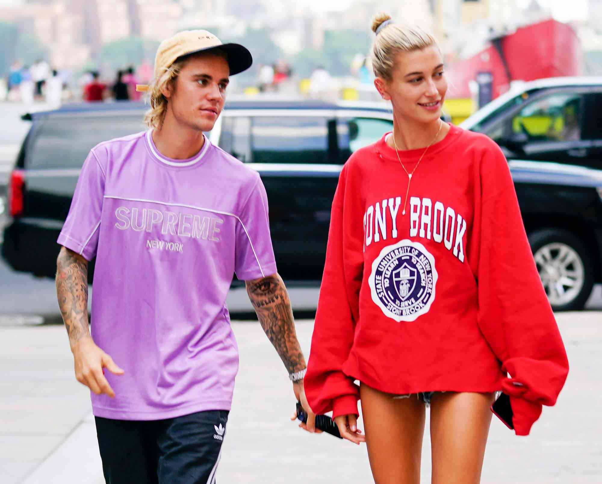 Justin Bieber plays around making Hailey Baldwin laugh as they go to see a movie in New York