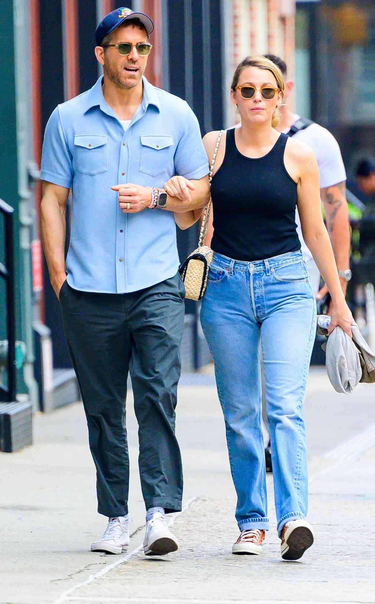  Blake Lively and Ryan Reynolds walk arm-in-arm while out for a morning stroll in NYC.