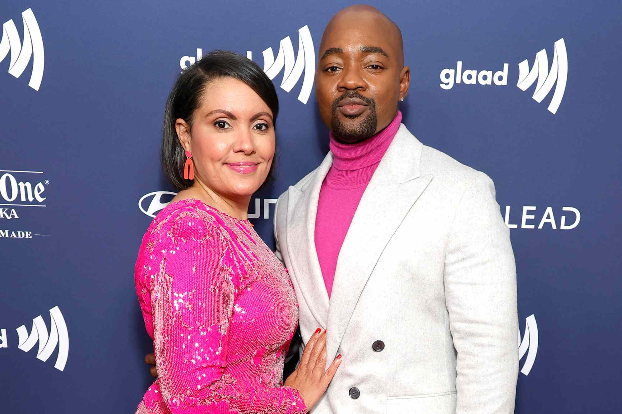 Brian Michael Smith (R) and wife Denise Perez attend the GLAAD Media Awards at The Beverly Hilton on March 30, 2023 in Beverly Hills, California